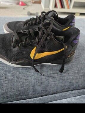Nike Kobe Kids Black Sneakers with Yellow Swoosh and Purple Heel Accents